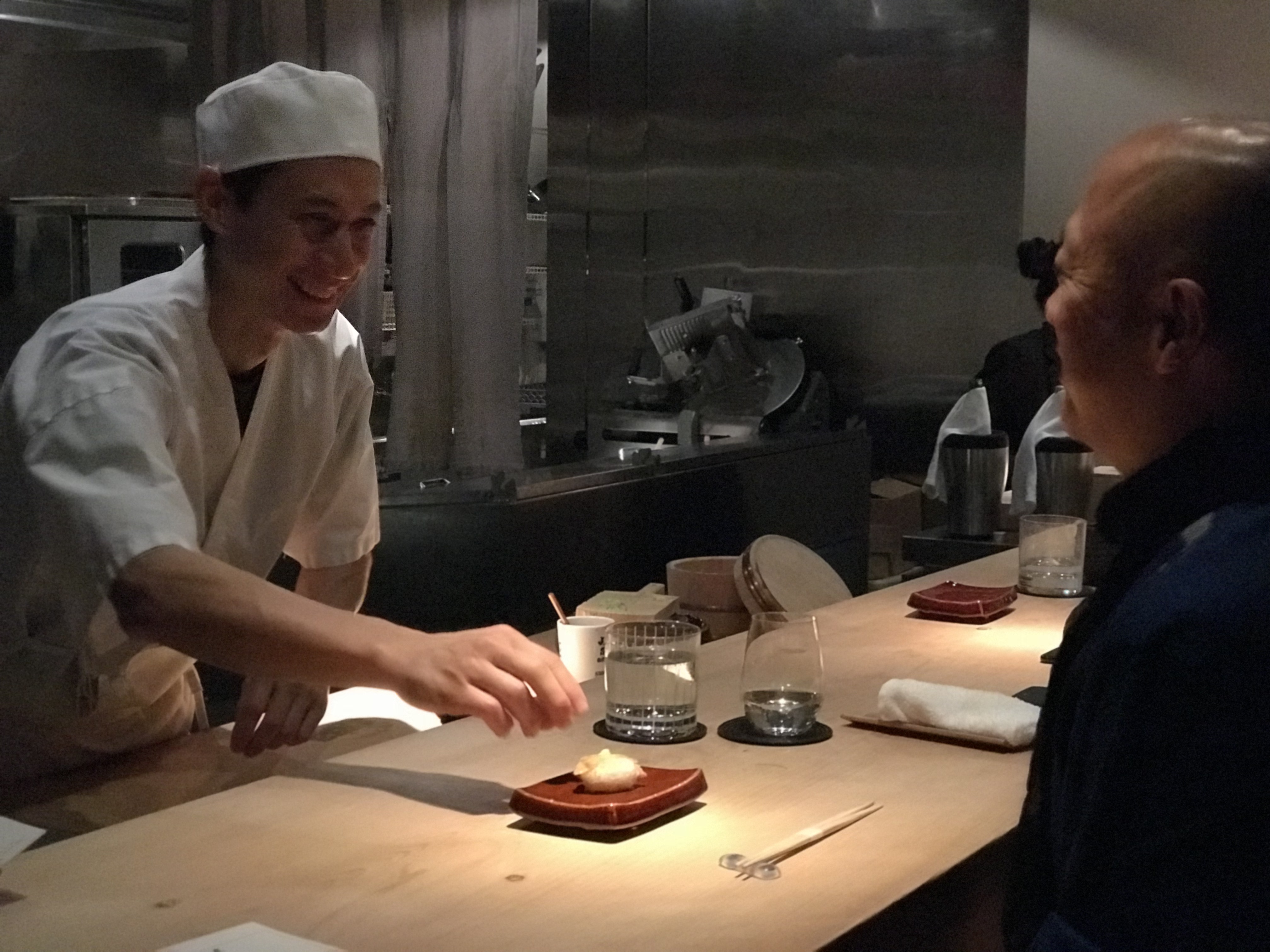 Kevin Cory serving sushi to Toshio Ohi on pottery made by Toshio Ohi at NAOE Miami