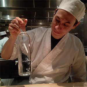 Chef Kevin Cory holding the first Veren Water bottle in America